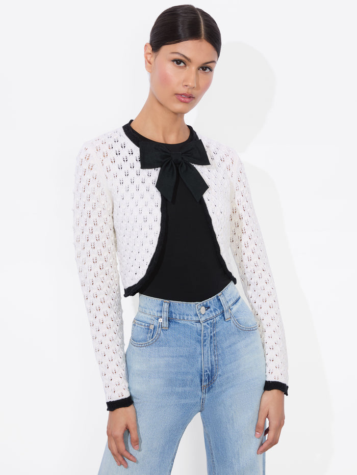 DANNIE SHRUG BOW CARDIGAN - SOFT WHITE/BLACK